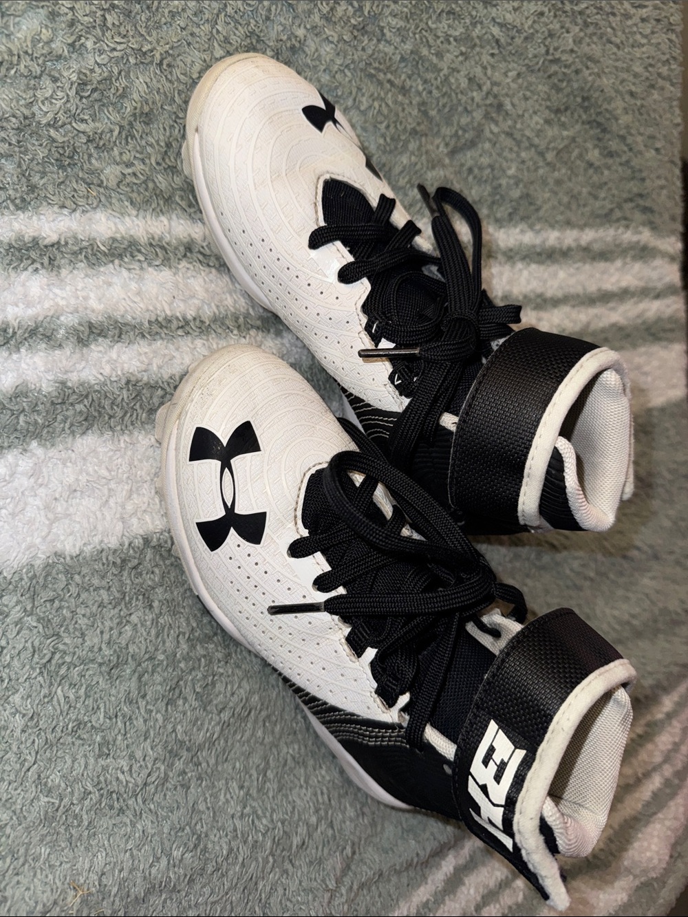 Under Armour Kids Black and White High-Top cleats
